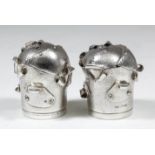 A pair of Elizabeth II novelty salt and pepper pots in the "Steampunk" style, 2ins high, by J.L.K,