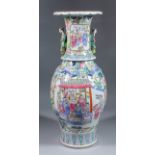 A Chinese "Cantonese" porcelain two-handled vase enamelled in colours and gilt with figures within