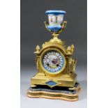 A French ormolu and porcelain mounted mantel clock No. 9045 11, the 3.375ins diameter porcelain dial