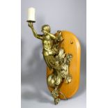 A late 19th/early 20th Century brass and gas light wall bracket cast and finely chiselled as a Neo-