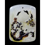 A Chinese agate rectangular pendant with brown inclusions, carved with two figures and bats to