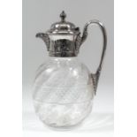 A Victorian bulbous glass and plated mounted claret jug, the mounts engraved with leaves and with