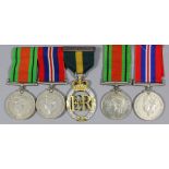 Eleven medals (un-attributed) comprising a group of three, World War II 1939-1945 Defence Medal,