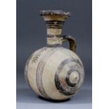 A Cypriot pottery white painted ware barrel-shaped flask painted with concentric circles and in "Fir