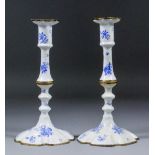 A pair of George III blue and white enamel and gilt brass mounted pillar candlesticks with sexfoil