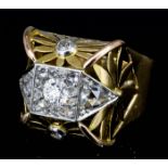 An early 20th Century French gentleman's 18ct gold and diamond ring,set with fourteen old cut