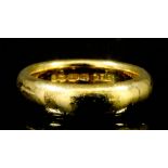 A 22ct gold plain wedding band (gross weight 13 grammes - ring size N)