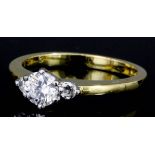 A modern 18ct gold mounted diamond solitaire ring, the brilliant cut stone of approximately .33ct