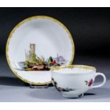 An 18th Century Meissen cup enamelled in colours with a Watteauesque scene of figures in a