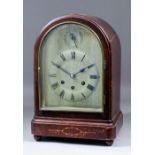 An early 20th Century stained wood cased mantel clock by Gustav Becker, No. 2337747, the arched