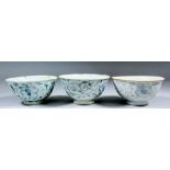 "The Nanking Cargo" - Three Chinese blue and white porcelain bowls painted with stylised flowers and