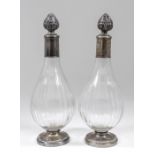 A pair of French silver mounted slice cut glass decanters and stoppers by Robert Linzeler (1872-