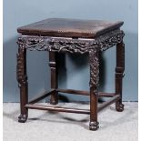 A Chinese rosewood square stand table, the flush panel top with carved bead edging, the apron boldly