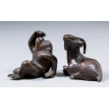 Two Japanese small brown patinated bronze figures of a seated monkey and a goat, both 1.5ins (4cm)