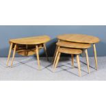 A modern nest of three Ercol elm and beechwood occasional tables, each on three splayed legs, 25.