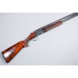 A good 12 bore over and under shotgun by Classic Doubles (formerly Winchester), Serial No. CB255,