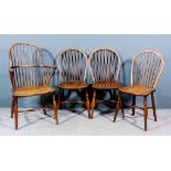 A 19th Century yew wood and elm seated stick back Windsor armchair with two tier stick back,