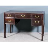 A Chinese hardwood rectangular desk with flush panelled top, fitted five drawers, brass angled