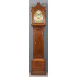 An 18th Century oak longcase clock by Henry Goddard of Dover, the 12ins arched brass dial with