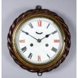 A wall clock with 6.5ins diameter ceramic dial with Roman numerals in red and black, to the two