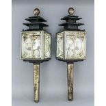 A pair of 19th Century carriage lamps with bevelled glass panels, 21ins x 5.5ins