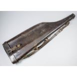 An English leather leg of mutton gun case, brown stitched leather, interior canvas lined with wooden