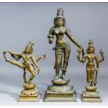 A Hindu bronze figure of Parvati as Shivakami, 19ins (48.2cm) high, and two other Hindu Gods