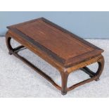 A Chinese Jichimu (chicken feather) wood rectangular stand with flush panel to top, on bowed legs