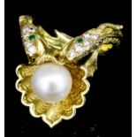 A modern 18ct pearl, diamond, and emerald set fish and seashell pattern ring, the central shell