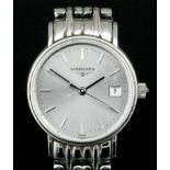 A lady's 1960's stainless steel cased Longines wristwatch, the silver dial with baton numerals and