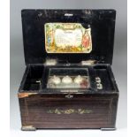 A late 19th Century Swiss eight air musical box with three bells in sight and 6ins cylinder, in