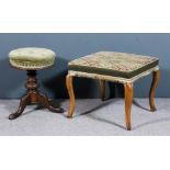 A Victorian walnut circular adjustable piano stool, the seat upholstered in green velour, on