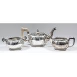 A 20th Century Indian silvery metal three piece tea service of "Art Deco" design, of bulbous lobed