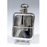 A George V silver and glass rectangular hip flask with bayonet top and removable cup, 4.75ins