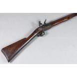 A late 18th/early 19th Century English "Brown Bess" flintlock musket, 36ins barrel stamped with