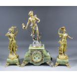 A late 19th Century French green onyx and gilt metal mounted three piece clock garniture retailed by