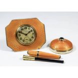 An early 20th Century silver and orange enamel cased desk timepiece, retailed by W. Allemann of