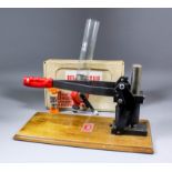 A reloading press by Wamadet, plus associated reloading equipment including scales by Hornady, and