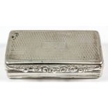 A William IV silver rectangular snuff box with cast leaf scroll thumbpiece, engine turned lid and