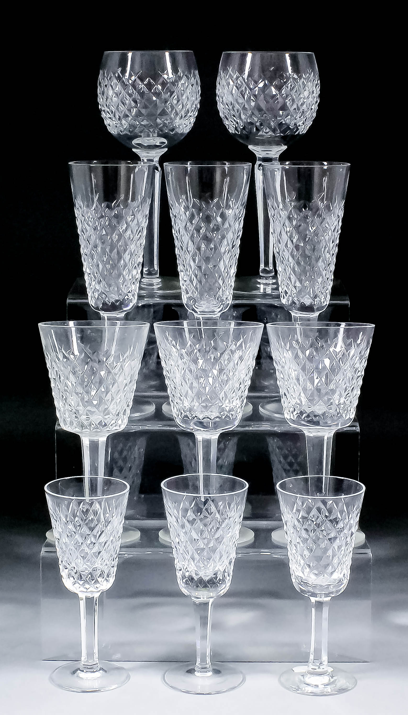 A Waterford diamond cut glass part table service (eighteen pieces), and a quantity of Waterford