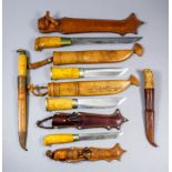 A quantity of Finish Pukko hunting knives, comprising of four by J. Marttuni (11ins, 10ins, 9ins,