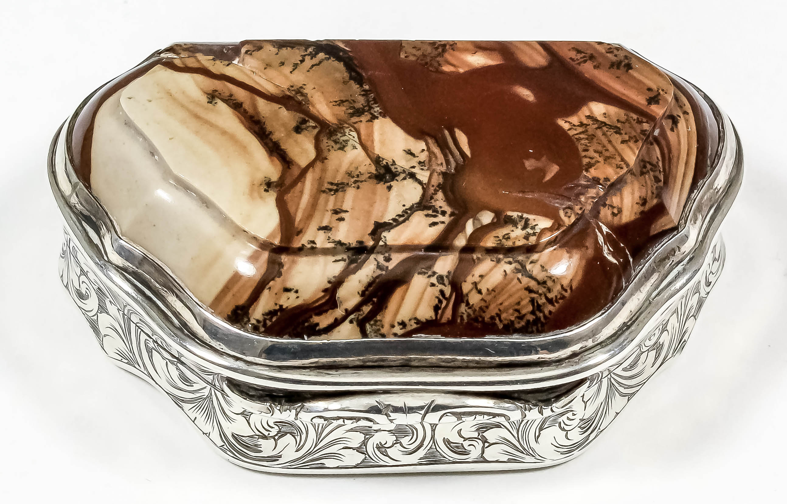 A Victorian silver snuff box of shaped outline, the lid inset with moss agate, the sides and base