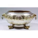 An Indian silvery metal and parcel gilt bulbous two-handled bowl with gadroon mounts to rim, the