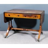 A mahogany sofa table with twin reeded edge to top, fitted two real and two dummy drawers, on twin