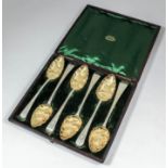 A harlequin set of six George III silver and silver gilt "Berry" spoons, the handles engraved with