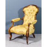 A Victorian walnut framed open arm easy chair, the shaped back with moulded show wood frame, seat