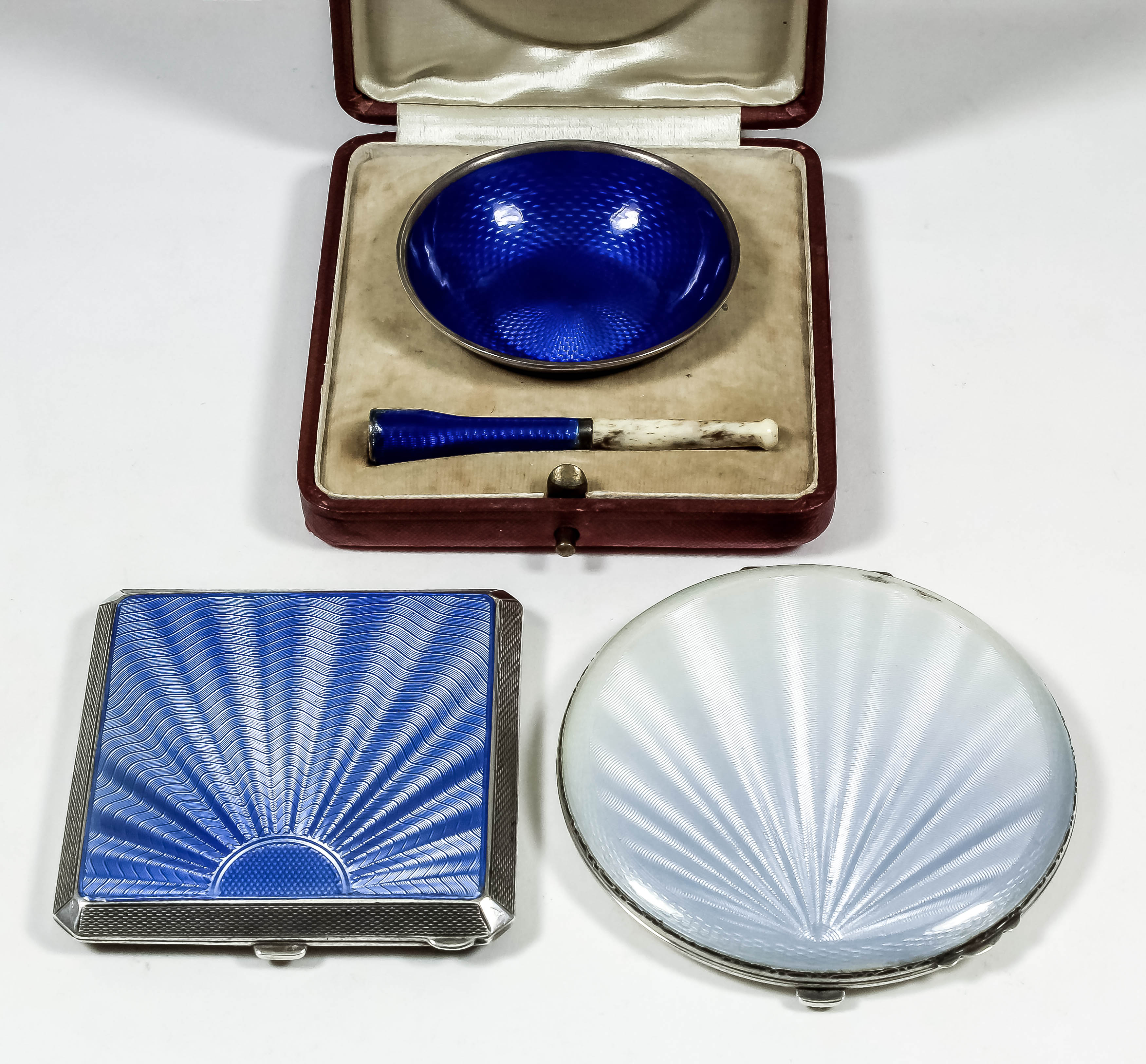 A George VI silver and sky blue guilloche enamel compact with engine turned borders and base, 2.