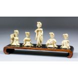 Five Japanese carved ivory Okimono of Geisha girls at various pursuits, 1.75ins (4.4cm) to 2.