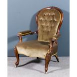 A Victorian walnut framed spoon back open arm easy chair, the moulded showwood frame with scroll