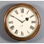 A mid-20th Century RAF oak cased dial wall clock, the 14ins diameter painted metal dial with Roman
